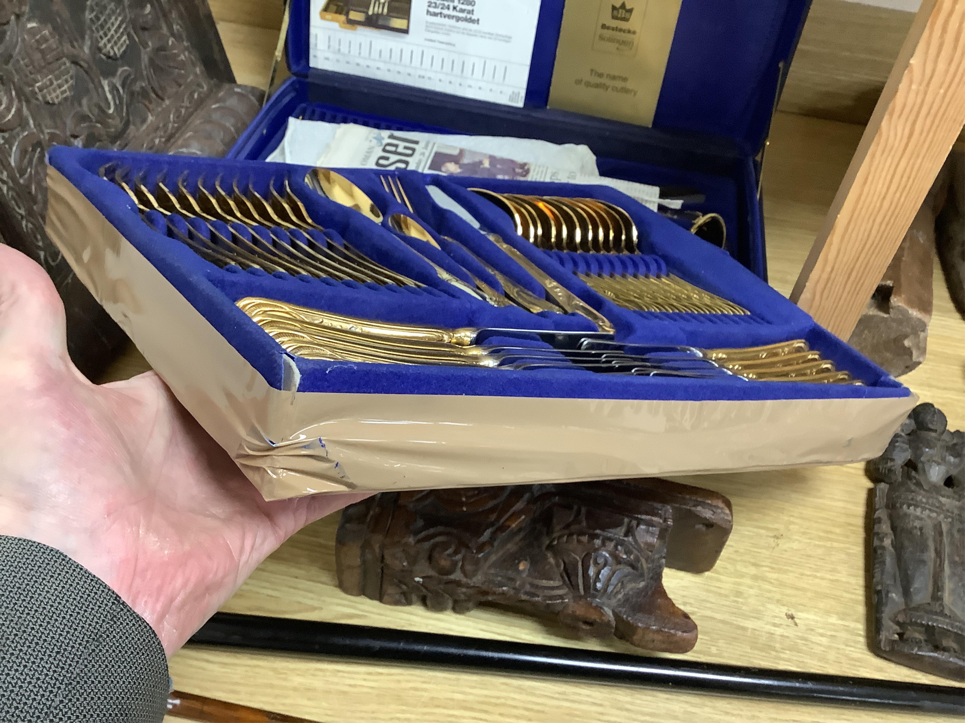 A Bestecke Solingen gold plated canteen of cutlery